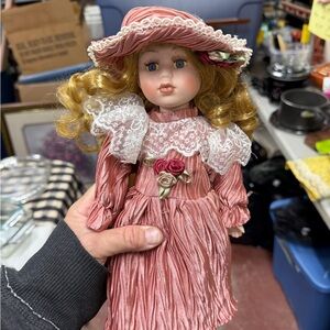 Elegant Pink Porcelain Doll with Hat